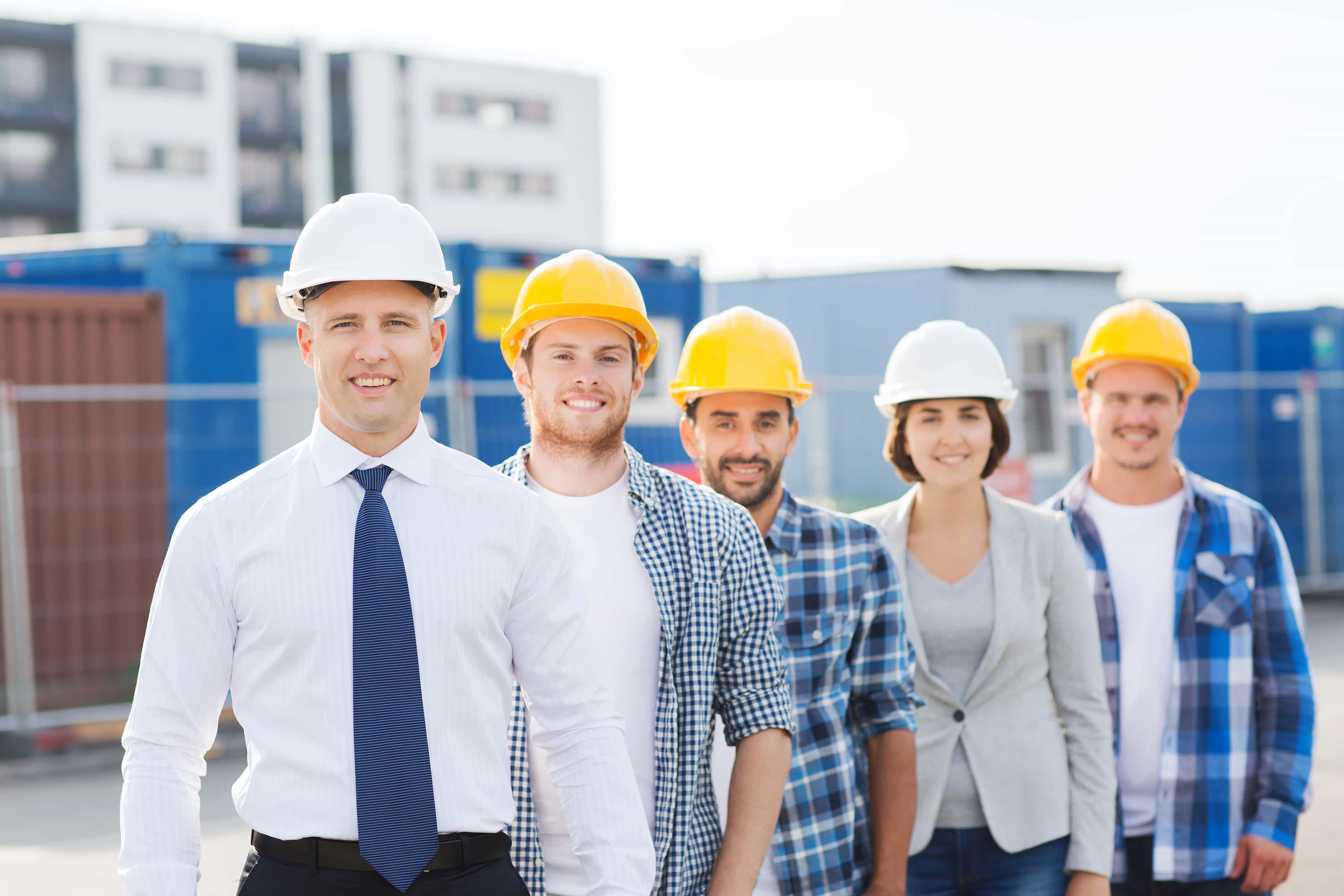 Workers in construction hats