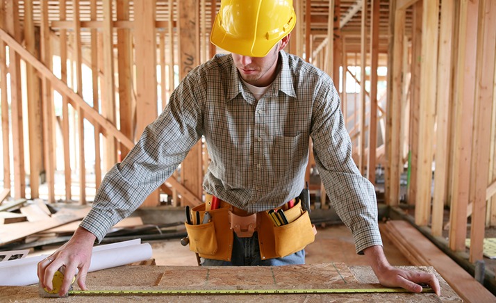 Man measuring on a table 